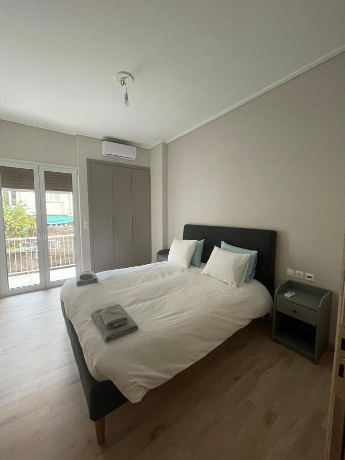 Optimal Point Atenas Exterior foto